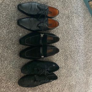 Black men’s dress and casual shoes.
